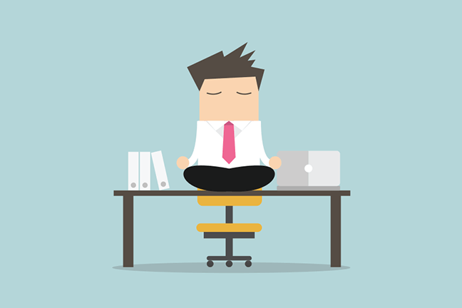 Man at his desk, relaxing